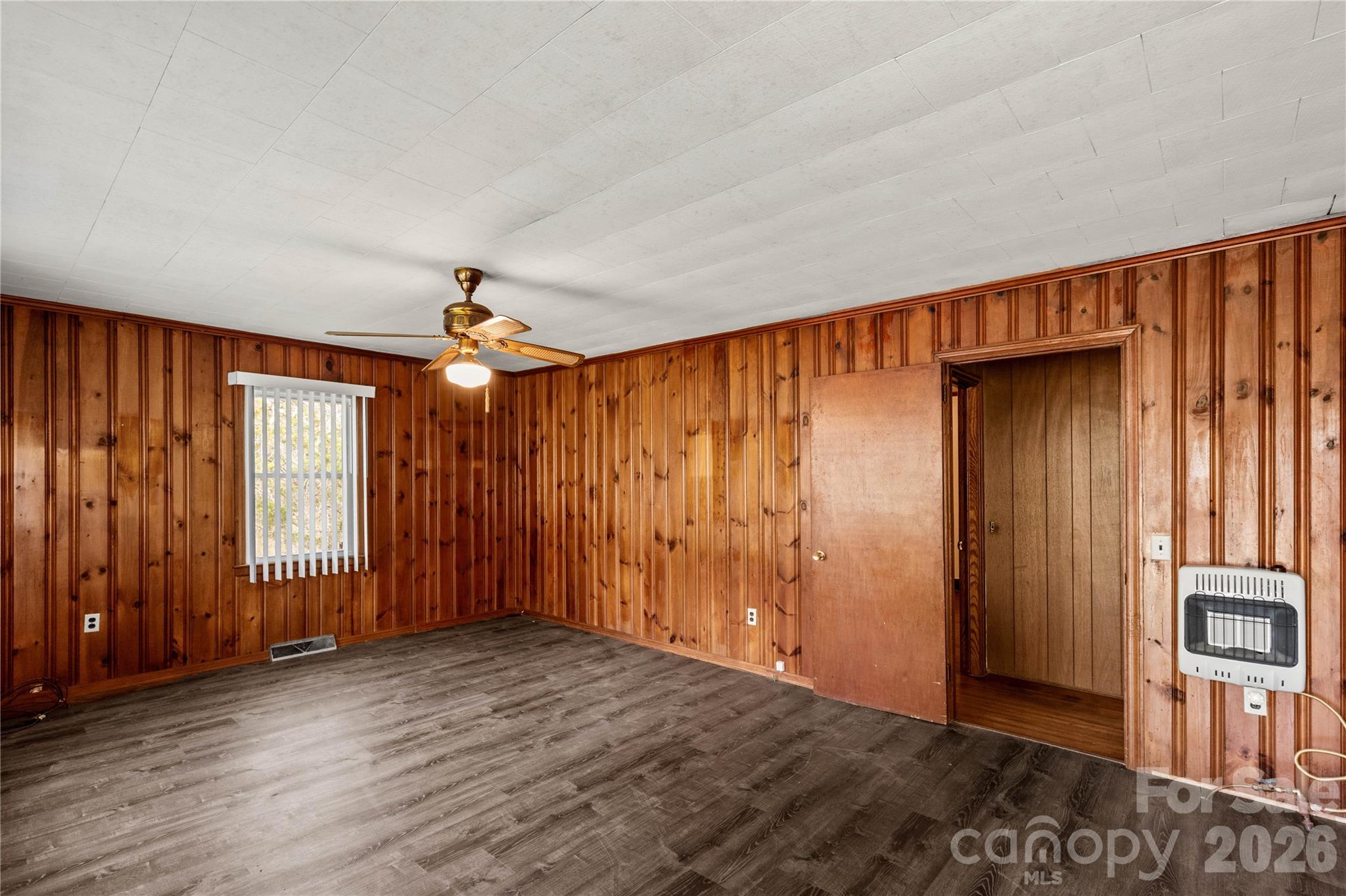 1724 State Rd S-29-39 Lancaster, SC 29720 - Photo 8 of 29 an empty room with wooden floor and windows