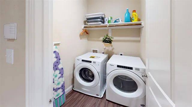 a utility room with dryer and washer