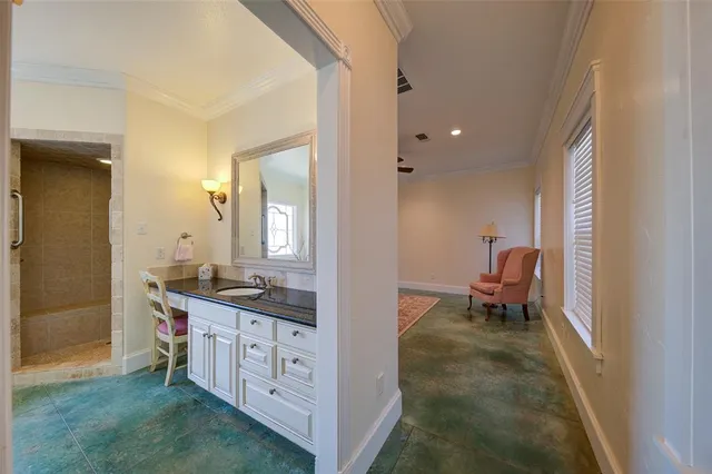a view of bathroom with dual sinks