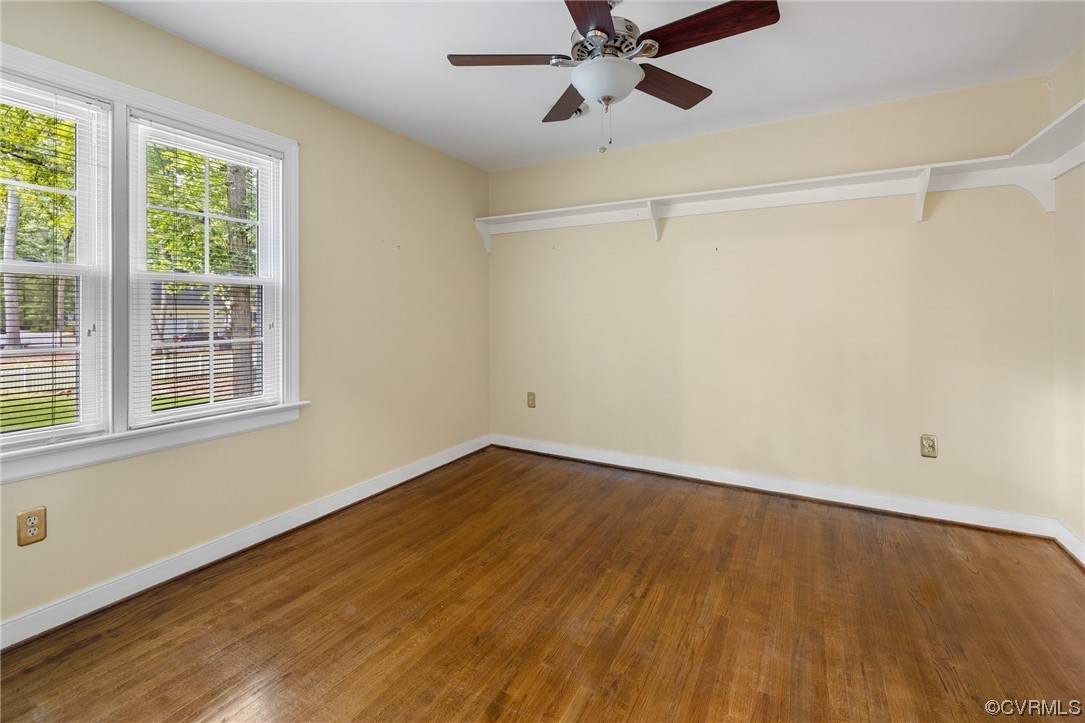 2210 Albion Road Midlothian, VA 23113 - Photo 29 of 36 a view of an empty room with a window and wooden floor