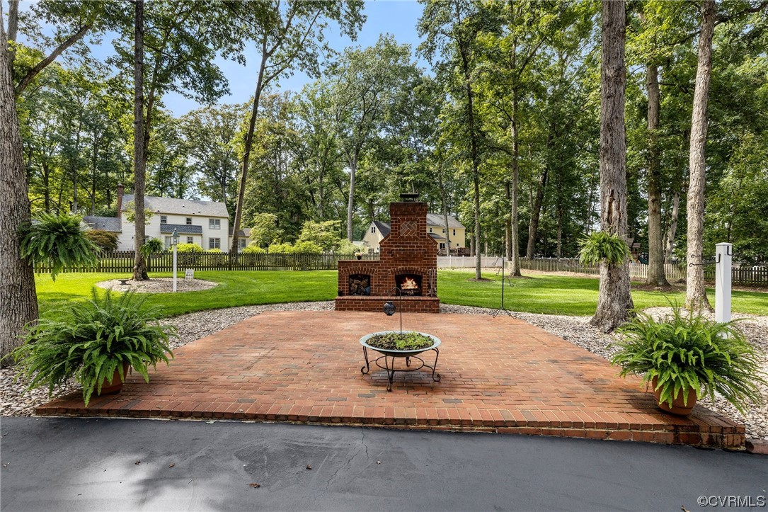 2210 Albion Road Midlothian, VA 23113 - Photo 32 of 36 a park view with a fountain plants and large trees