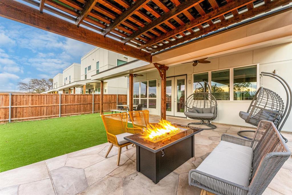 4013 Ivanhoe Lane Dallas, TX 75212 - Photo 38 of 38 View of patio / terrace with french doors, ceiling fan, and an outdoor fire pit