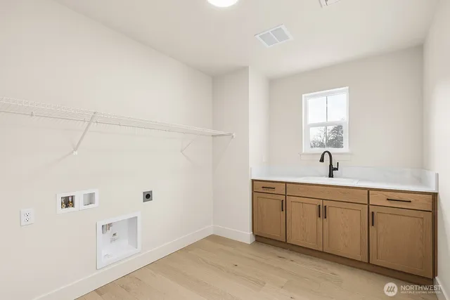 a bathroom with a sink a mirror and a bathtub