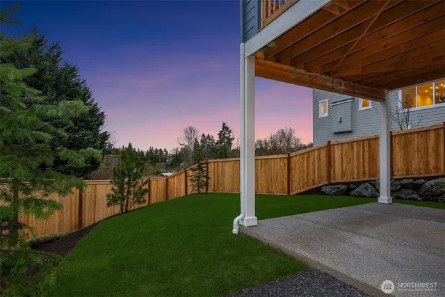 a view of a backyard with a garden