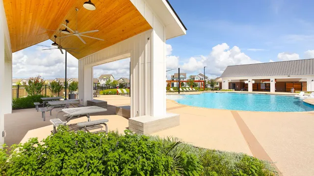 a view of an ocean with a swimming pool