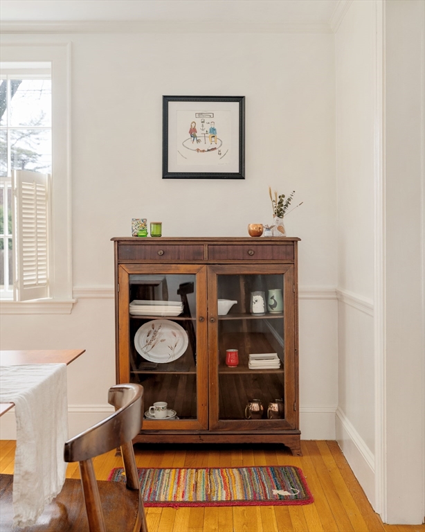 162 Colon Street Beverly, MA 01915 - Photo 11 of 35 a view of a room that has a table and a chair in it