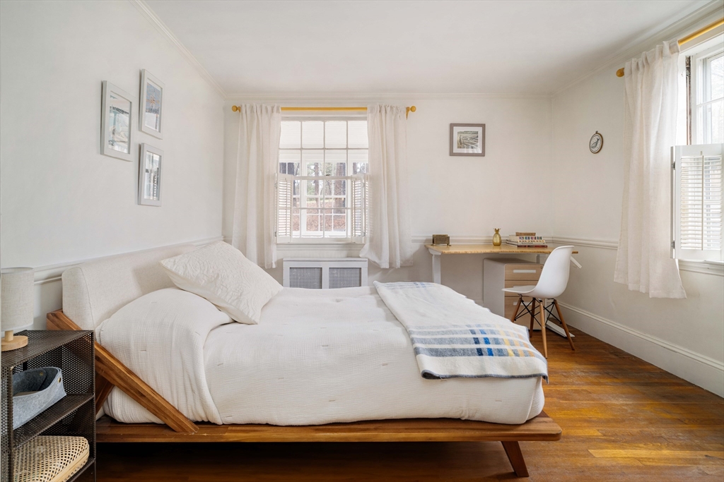 162 Colon Street Beverly, MA 01915 - Photo 19 of 35 a bedroom with a bed and a window
