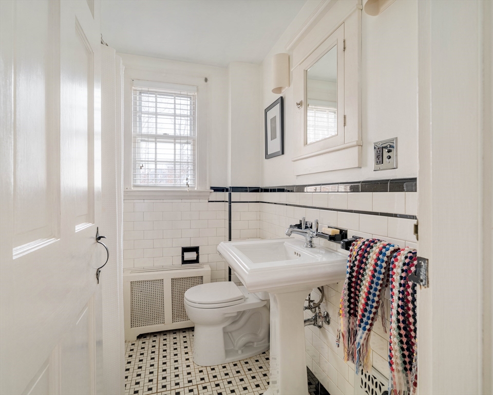 162 Colon Street Beverly, MA 01915 - Photo 20 of 35 a bathroom with a sink toilet and mirror