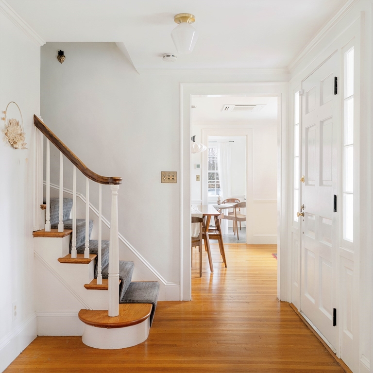 162 Colon Street Beverly, MA 01915 - Photo 2 of 35 a view of entryway and hall with wooden floor