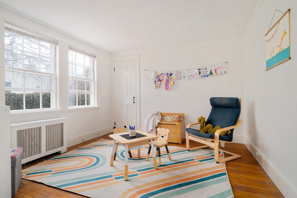 162 Colon Street Beverly, MA 01915 - Photo 22 of 35 a living room with furniture and a window