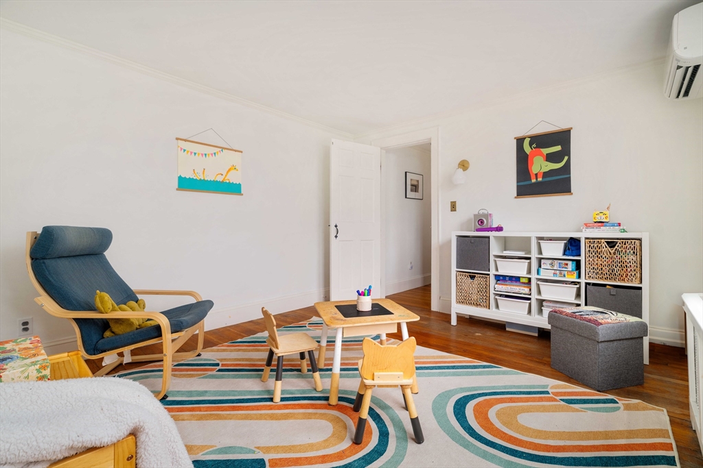 162 Colon Street Beverly, MA 01915 - Photo 23 of 35 a living room with furniture and wooden floor