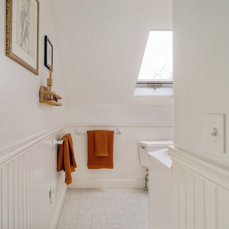 162 Colon Street Beverly, MA 01915 - Photo 28 of 35 a view of small space with racks on the wall