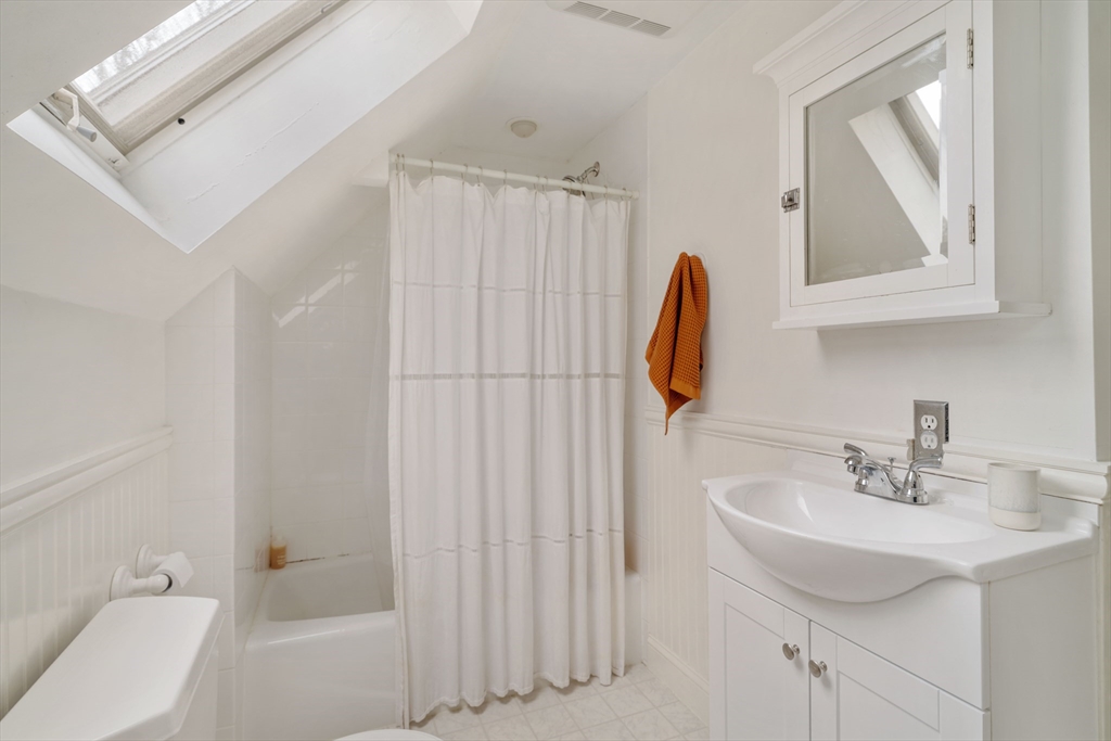 162 Colon Street Beverly, MA 01915 - Photo 29 of 35 a bathroom with a sink toilet and shower