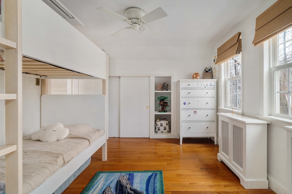 162 Colon Street Beverly, MA 01915 - Photo 30 of 35 a bedroom with a bed and a window