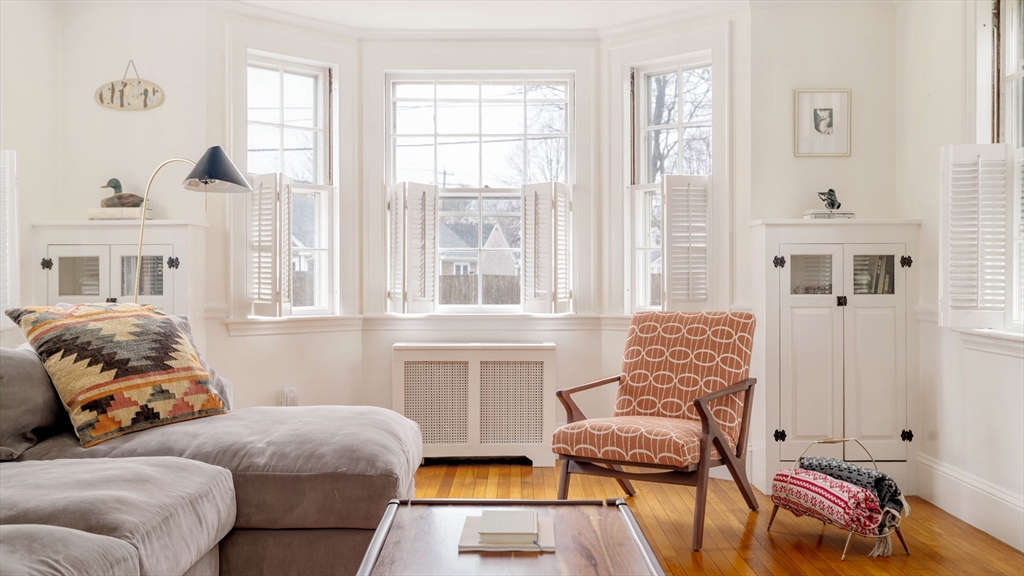 162 Colon Street Beverly, MA 01915 - Photo 7 of 35 a living room with furniture and a window