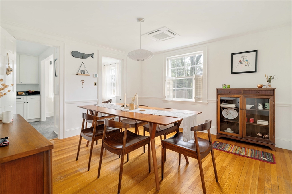162 Colon Street Beverly, MA 01915 - Photo 10 of 35 a view of a dining room with furniture and wooden floor