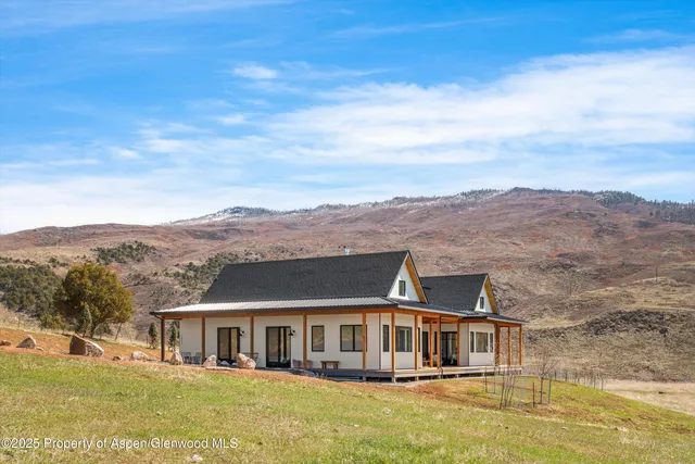 aerial view of residential houses with open space
