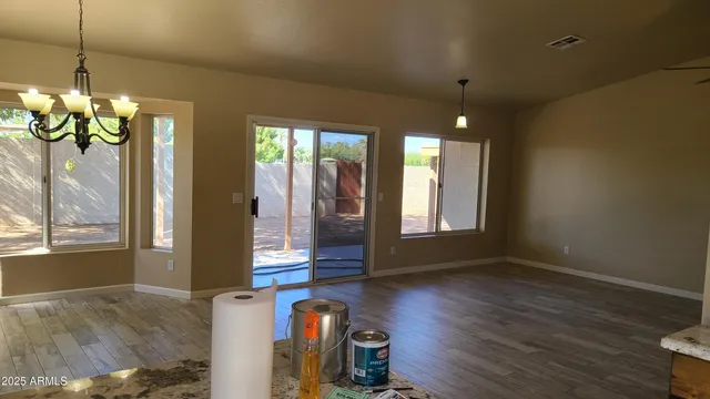 a kitchen with a refrigerator and a sink