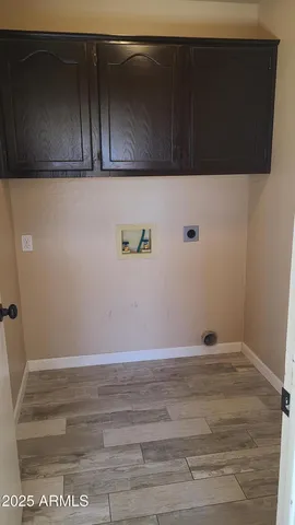 a bathroom with a double vanity sink and mirror