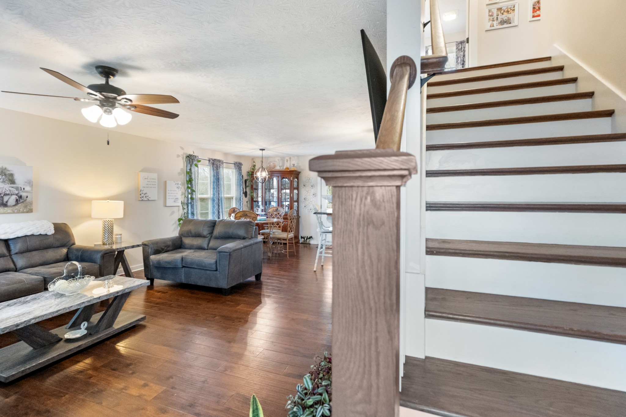 828 Kirbytown Road Lafayette, TN 37083 - Photo 17 of 30 a living room with furniture and a chandelier