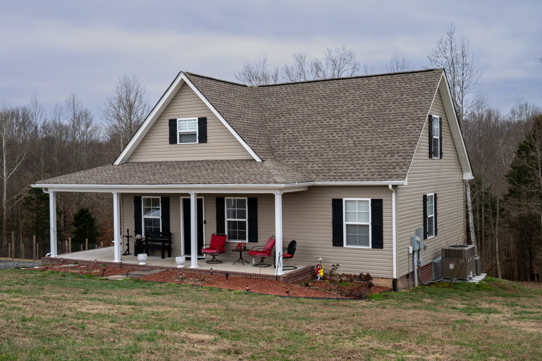 828 Kirbytown Road Lafayette, TN 37083 - Photo 2 of 30 a front view of a house with a yard