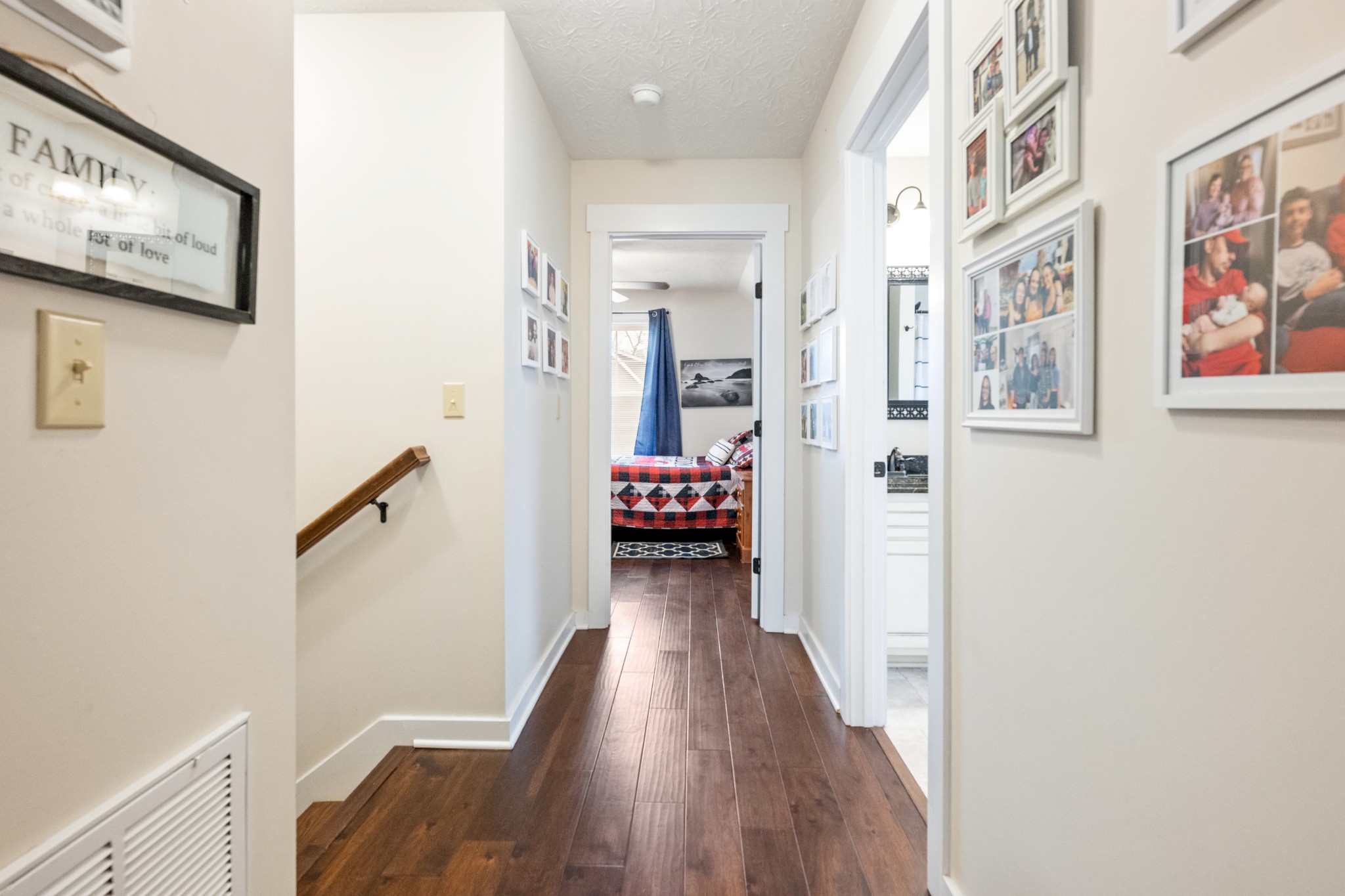 828 Kirbytown Road Lafayette, TN 37083 - Photo 22 of 30 a view of a hallway with wooden floor and staircase