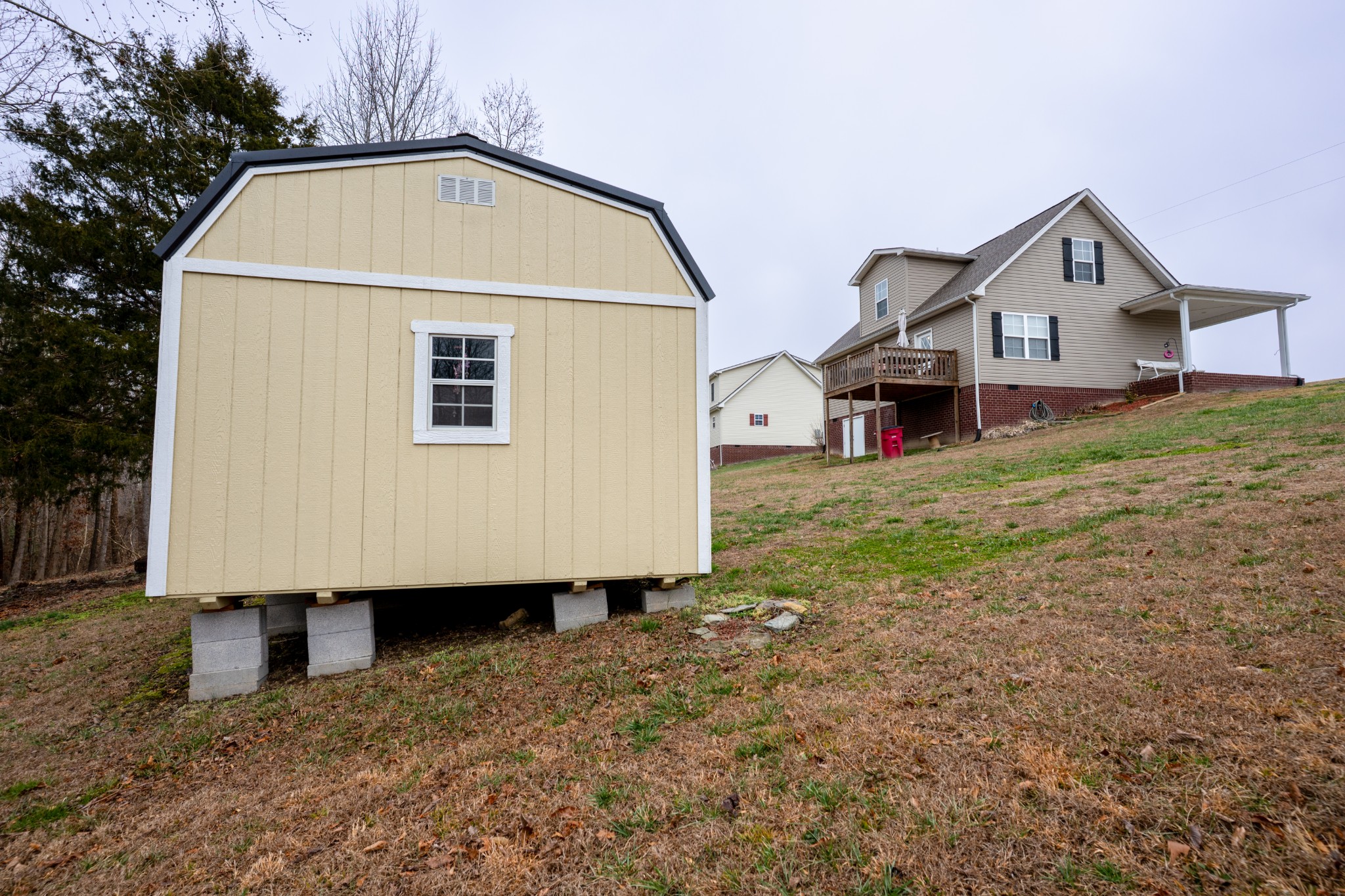 828 Kirbytown Road Lafayette, TN 37083 - Photo 29 of 30 a view of a house with backyard
