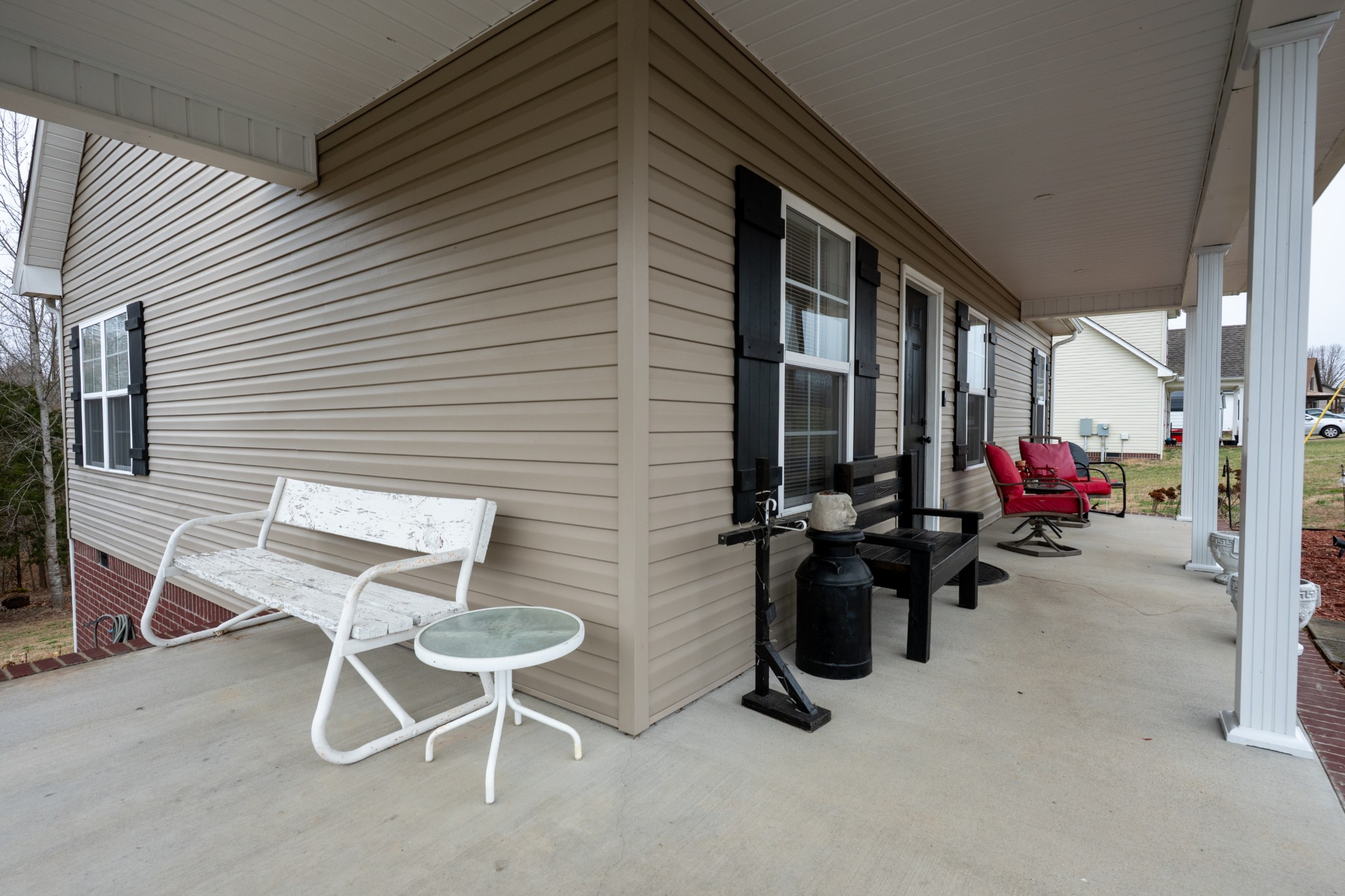 828 Kirbytown Road Lafayette, TN 37083 - Photo 3 of 30 a view of a chairs and tables in patio