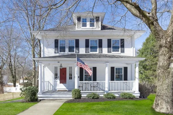 front view of a house with a yard