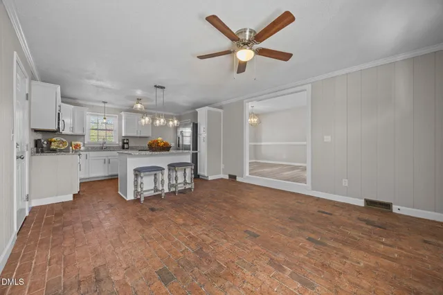 a view of an empty room and window