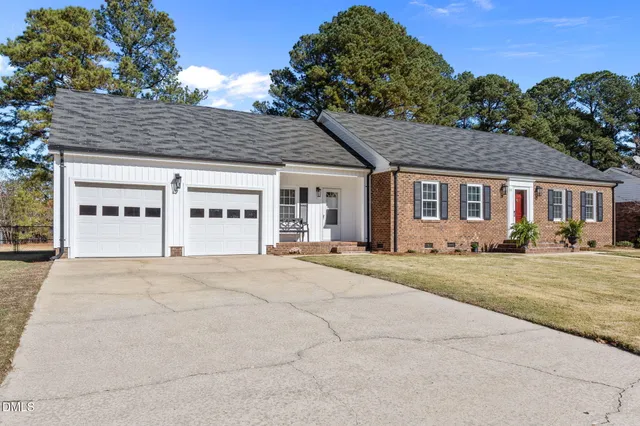 front view of a house with a street