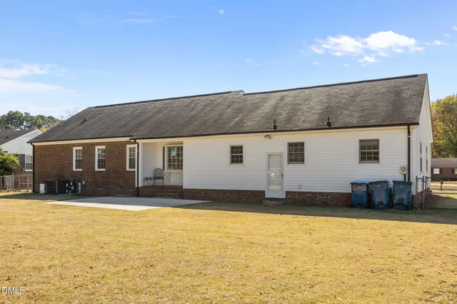a view of a house with a swimming pool
