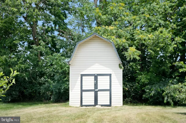 a view of backyard with green space