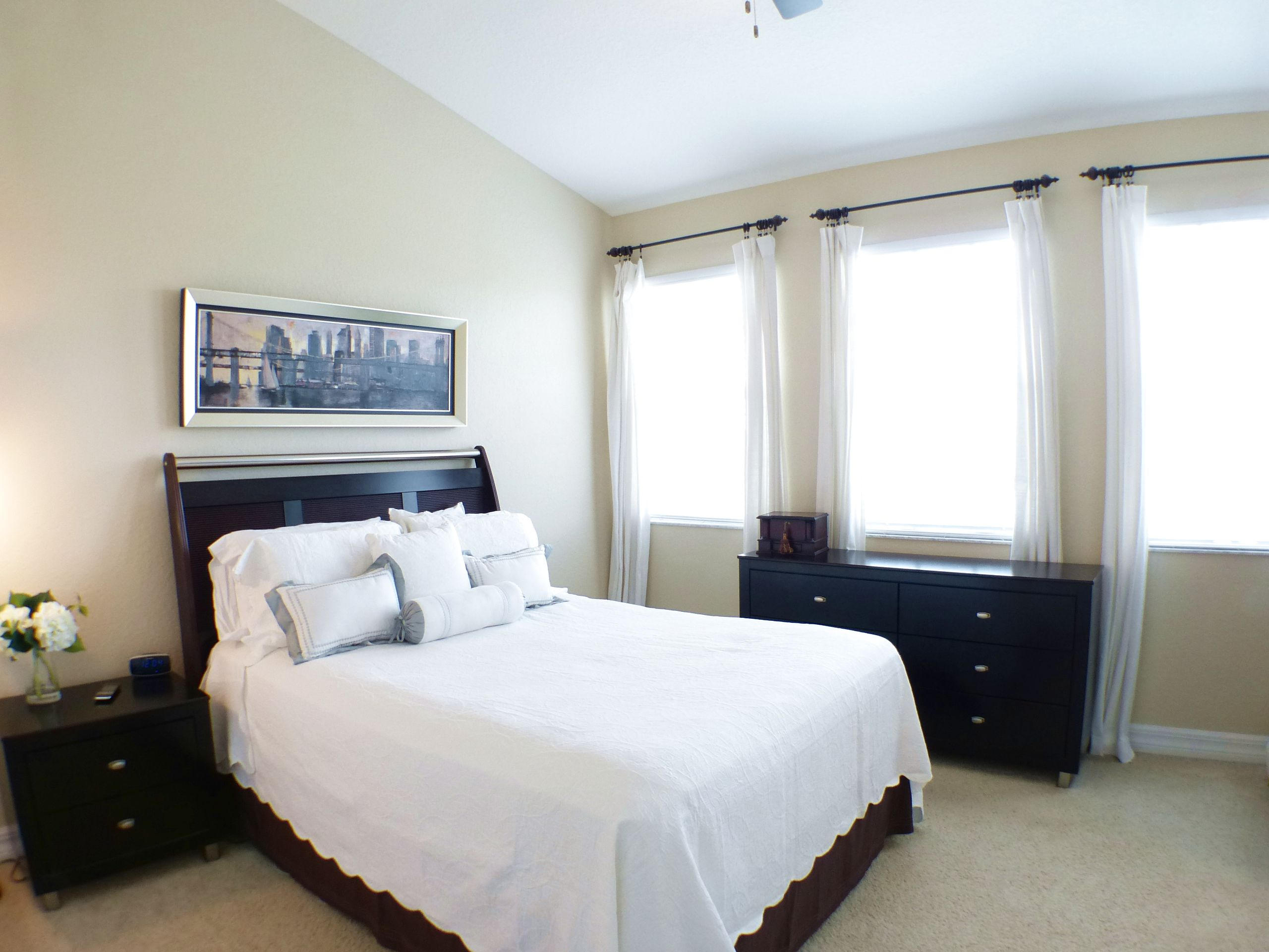 1826 Northwest 9th Street Boca Raton, FL 33431 - Photo 13 of 22 a bedroom with a bed and a window