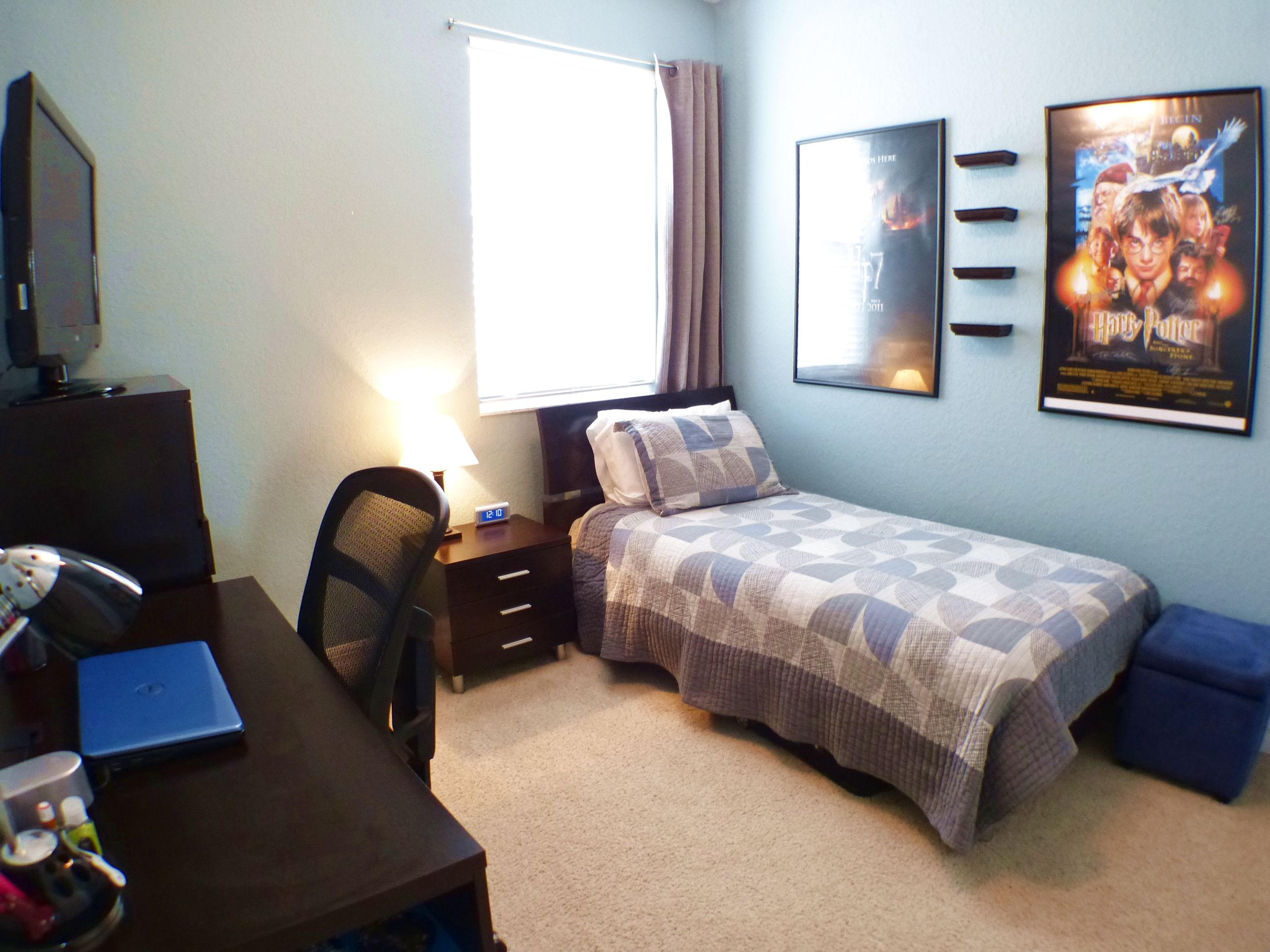 1826 Northwest 9th Street Boca Raton, FL 33431 - Photo 19 of 22 a bedroom with a bed and a flat screen tv