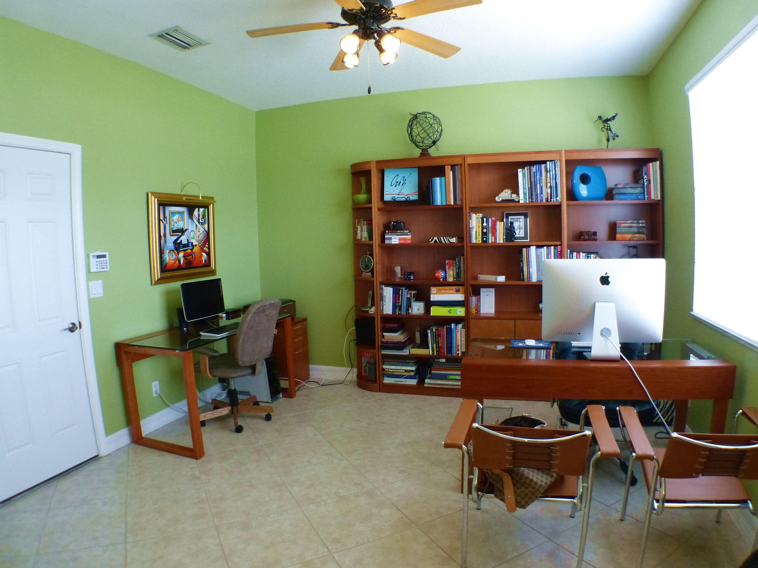 1826 Northwest 9th Street Boca Raton, FL 33431 - Photo 3 of 22 a room with furniture and musical instruments