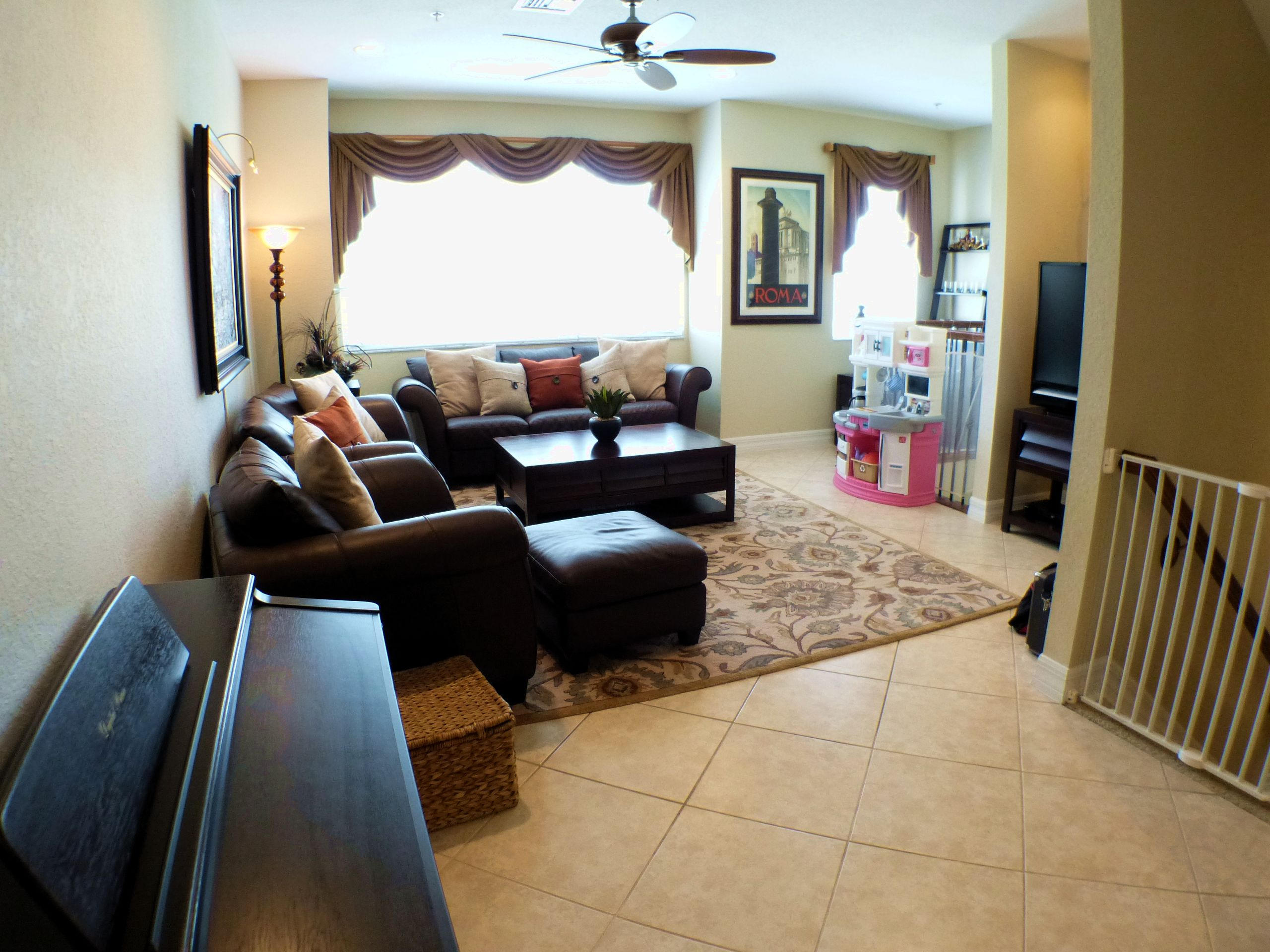 1826 Northwest 9th Street Boca Raton, FL 33431 - Photo 5 of 22 a living room with furniture and a large window