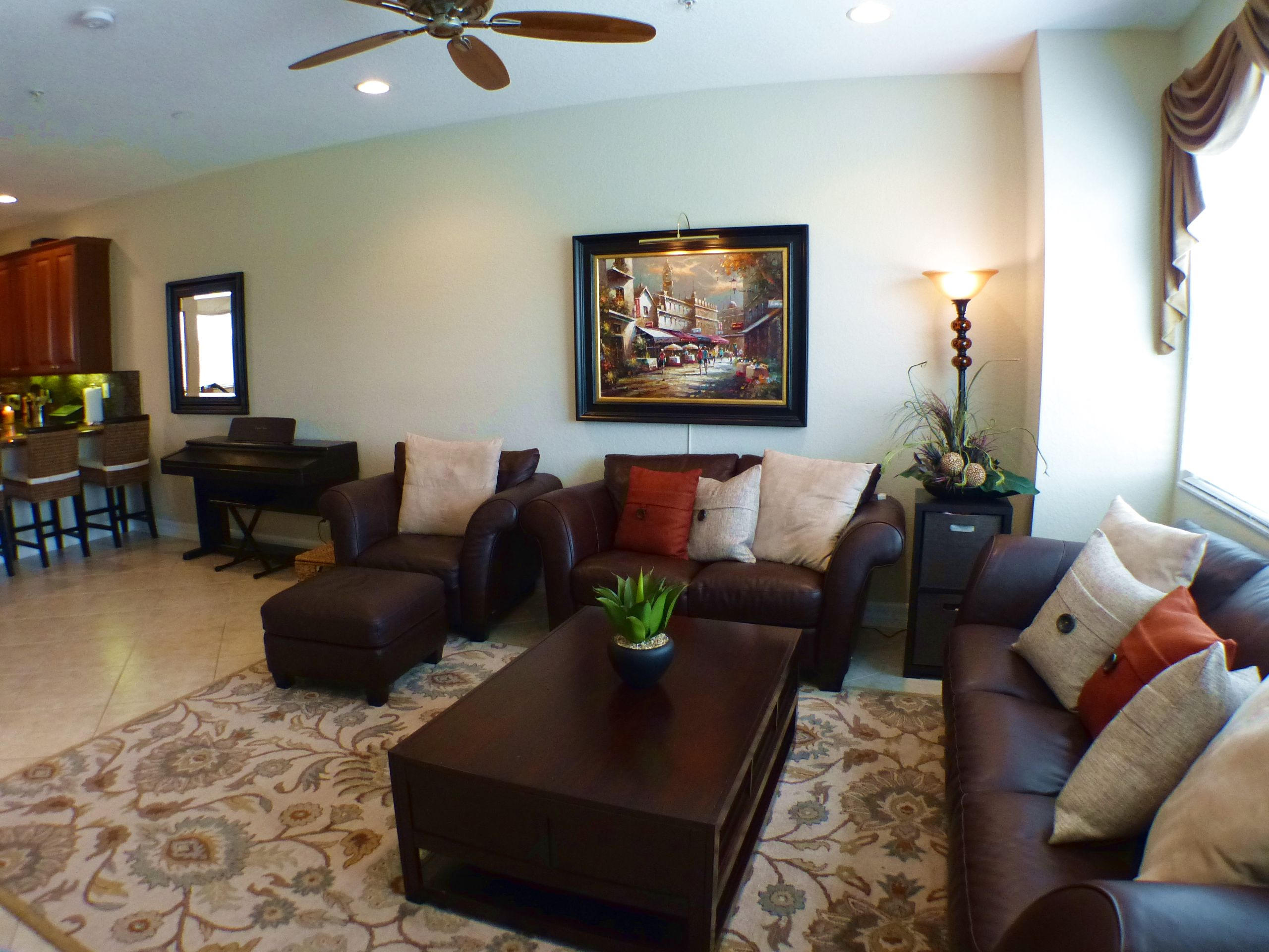 1826 Northwest 9th Street Boca Raton, FL 33431 - Photo 6 of 22 a living room with furniture and a rug
