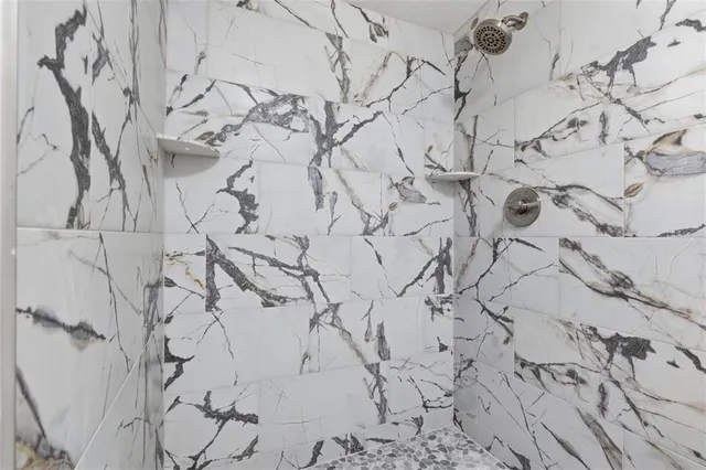 a bedroom with furniture and a wooden floor