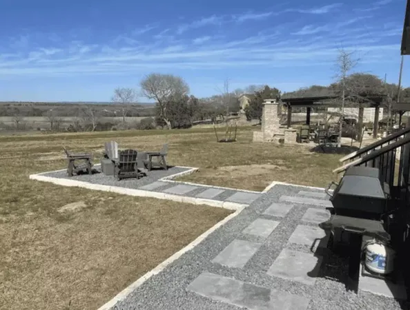 a terrace with outdoor seating and lake