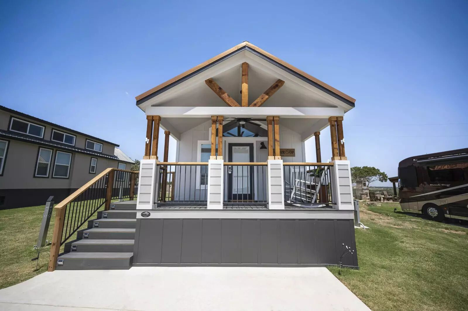5386 Ranch Road 1376, Unit 79 Fredericksburg, TX 78624 - Photo 23 of 39 View of front of property featuring a front yard and a porch