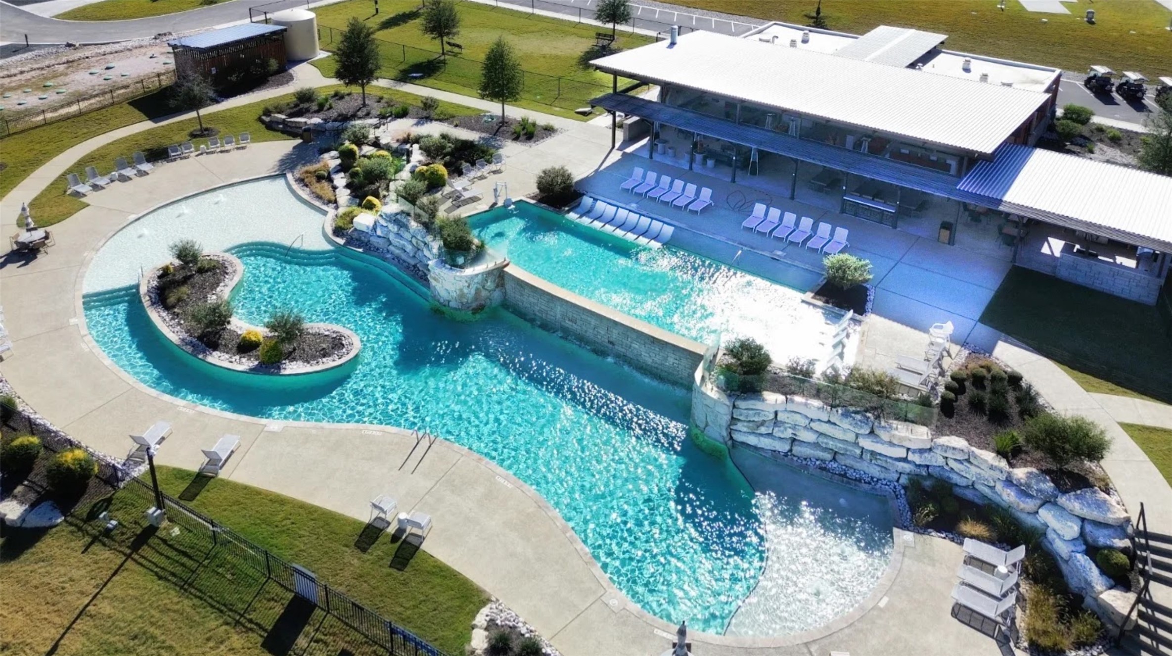5386 Ranch Road 1376, Unit 79 Fredericksburg, TX 78624 - Photo 24 of 39 Drone / aerial view of a pool area