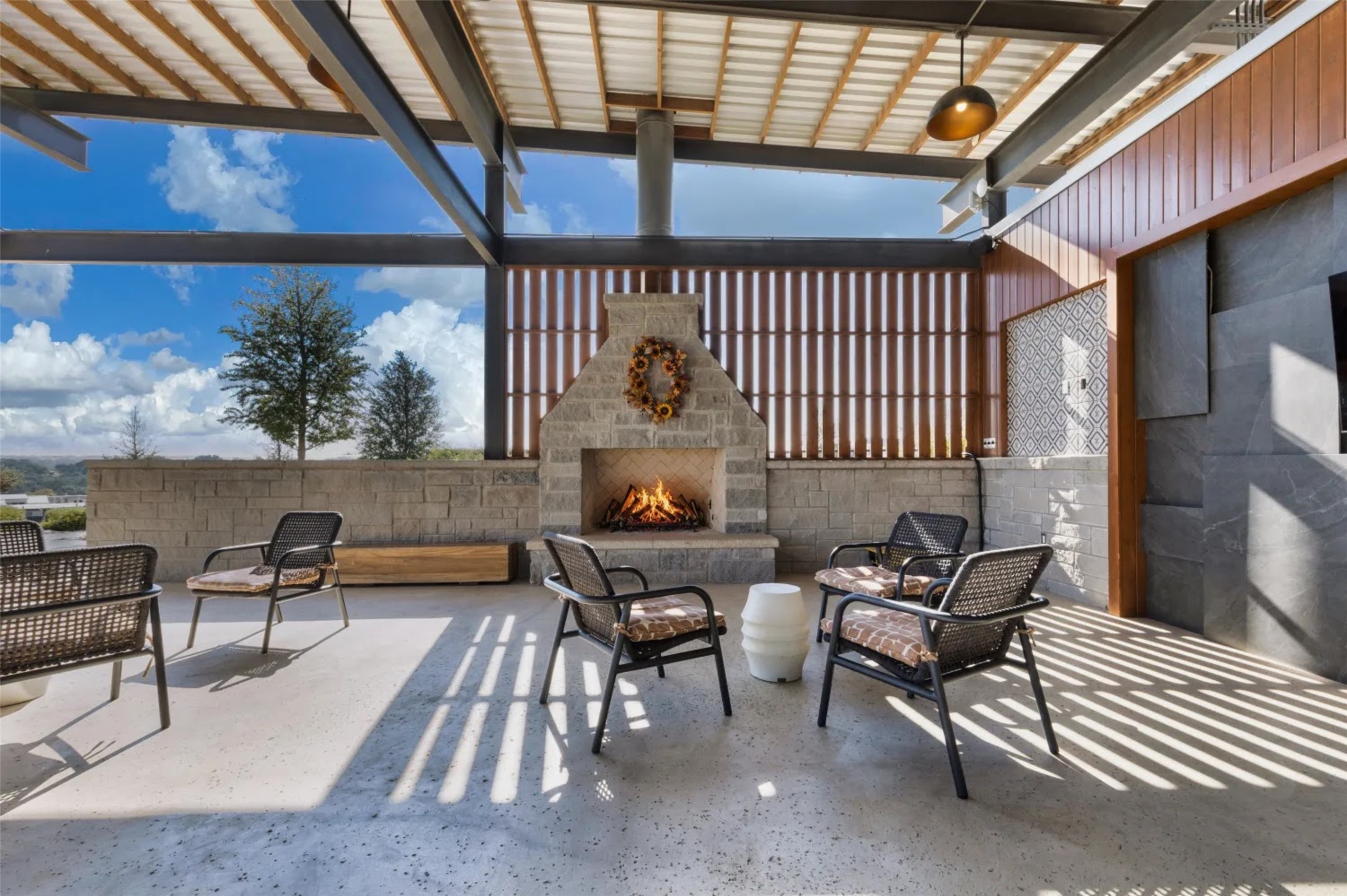 5386 Ranch Road 1376, Unit 79 Fredericksburg, TX 78624 - Photo 35 of 39 View of patio / terrace with an outdoor living space with a fireplace