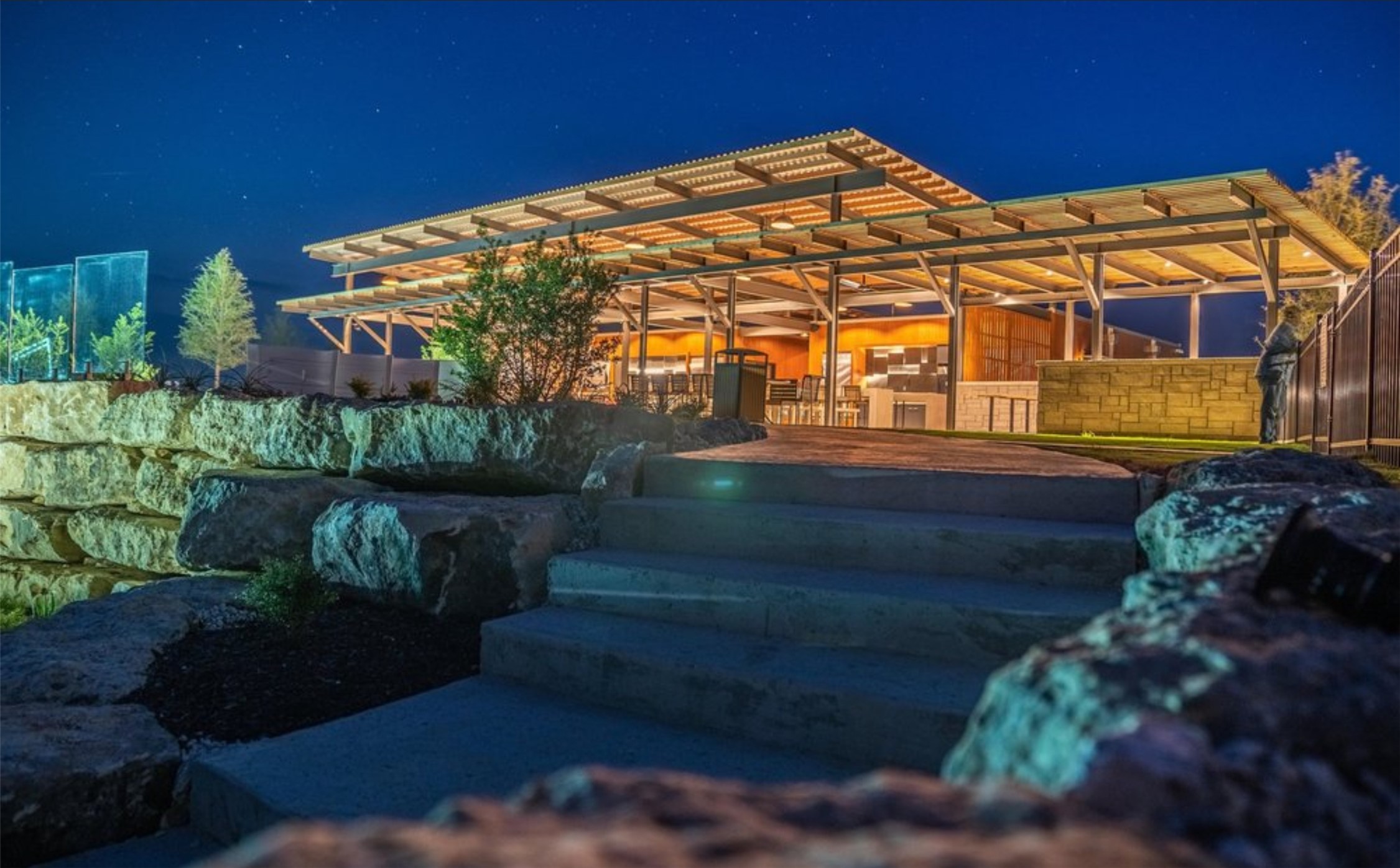 5386 Ranch Road 1376, Unit 79 Fredericksburg, TX 78624 - Photo 39 of 39 Patio at night featuring a pergola and a patio area