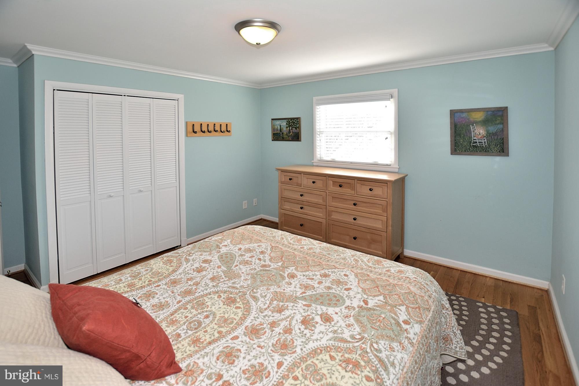 506 Tapawingo Road Southwest Vienna, VA 22180 - Photo 13 of 25 a bed room with a bed and a window