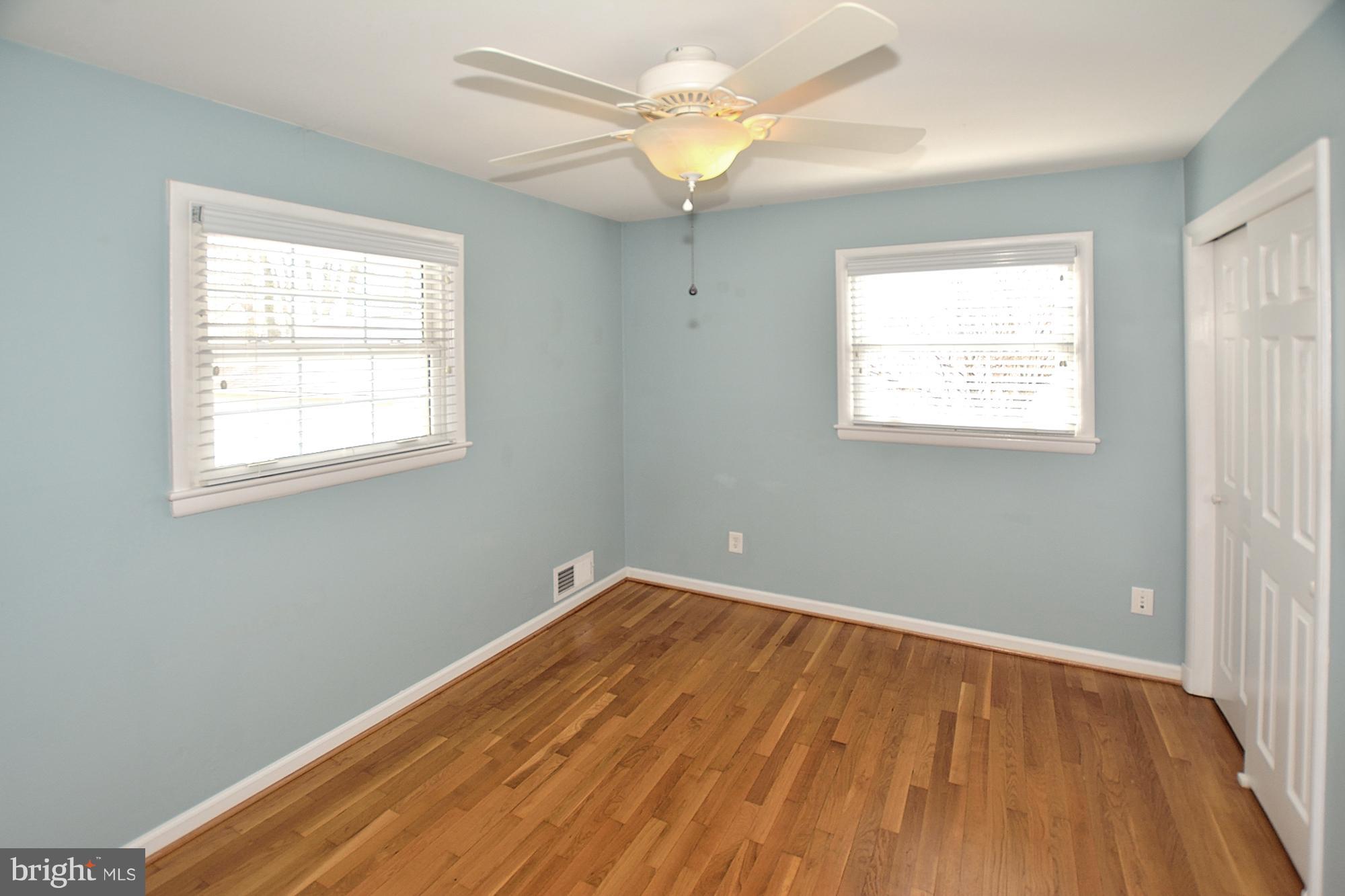 506 Tapawingo Road Southwest Vienna, VA 22180 - Photo 14 of 25 a view of a room with wooden floor and a window
