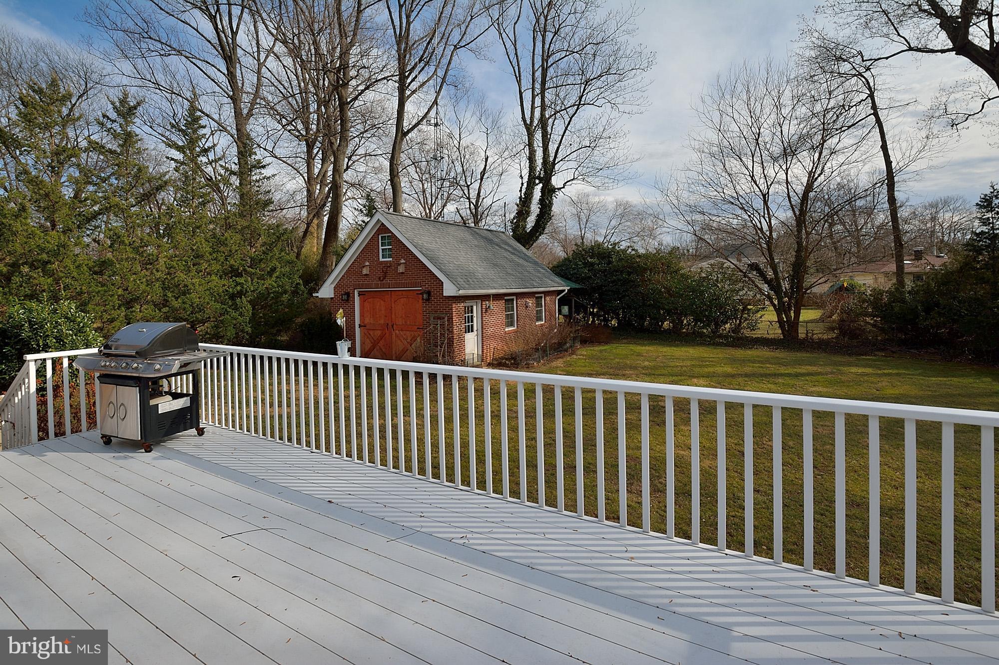 506 Tapawingo Road Southwest Vienna, VA 22180 - Photo 24 of 25 a view of a wooden roof deck