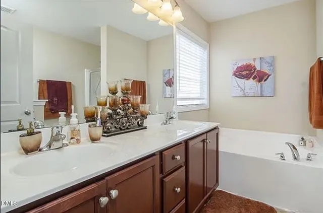 a kitchen with a sink and a window