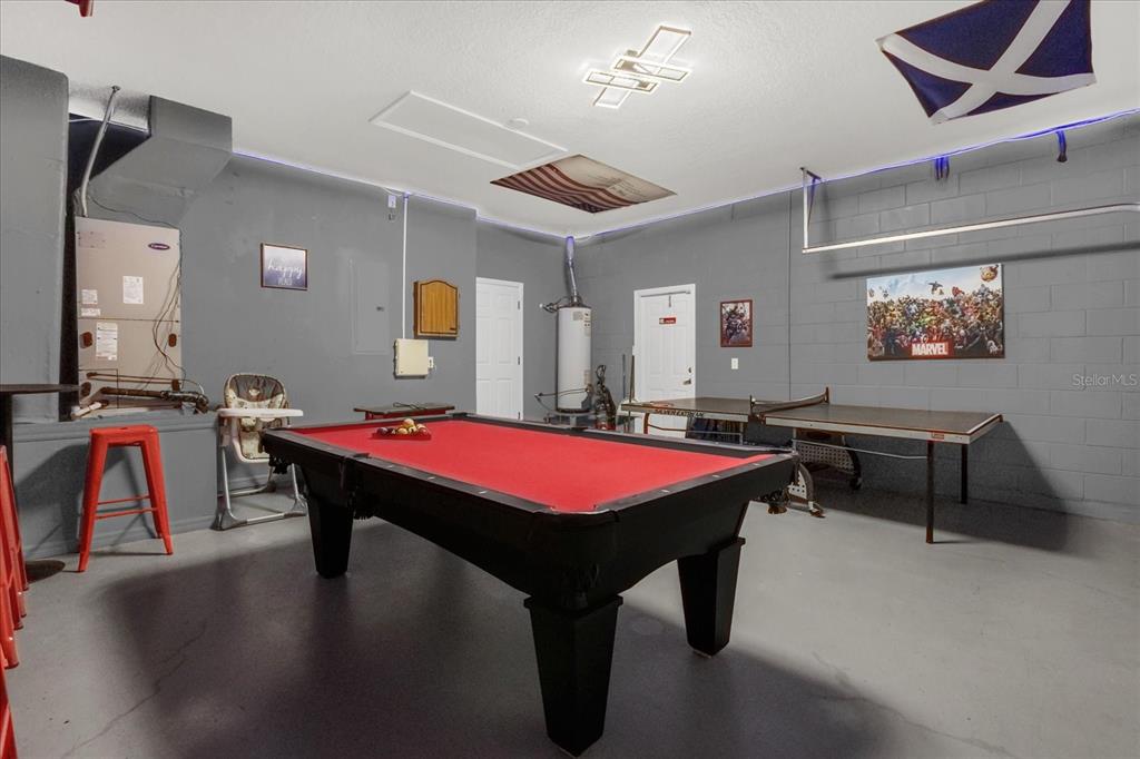 246 Montara Drive Davenport, FL 33897 - Photo 28 of 37 a room with pool table and windows