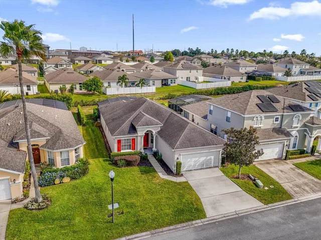 an aerial view of a house with a garden
